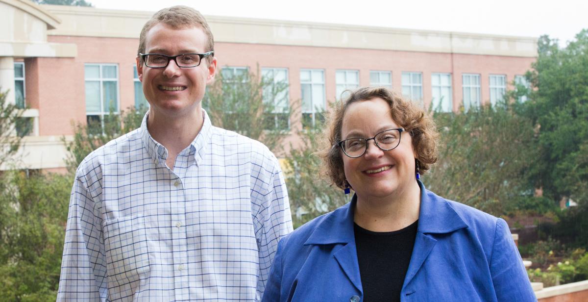Dr. Laura Moore, left, associate professor and chair of music, and Dr. Silas Leavesley, professor of chemical and biomolecular engineering, were named respectively as Phi Kappa Phi’s artist and scholar of the year.