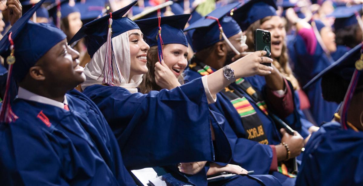 University of South Alabama graduates at fall 2022 Commencement at the USA Mitchell Center. 