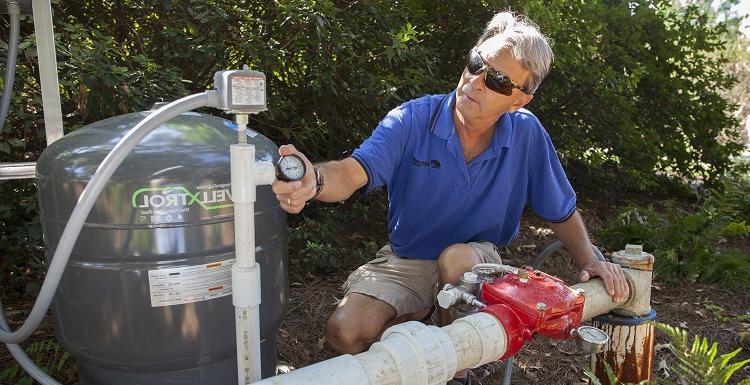 Landscaping Manager Gary Carley checks the campus wells daily.  Carley and his employees use the wells for irrigation purposes, such as watering grass and flowers, but the well water is also used in the generation of the chilled water used to cool the campus buildings.   