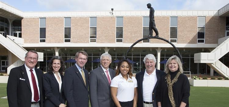 ?Setting the Pace,? a sculpture on the lawn of the Student Center amphitheater, is a gift from David and Lynn Gwin. At the sculpture?s dedication, from left, are Lynn Gwin; David Gwin; SGA President Danielle Watson; USA President Dr. Tony G. Waldrop; Dr. John Smith, vice president for student affairs; Dr. Krista Harrell, associate dean of students; and Dr. Joseph F. Busta Jr., vice president for development and alumni relations.