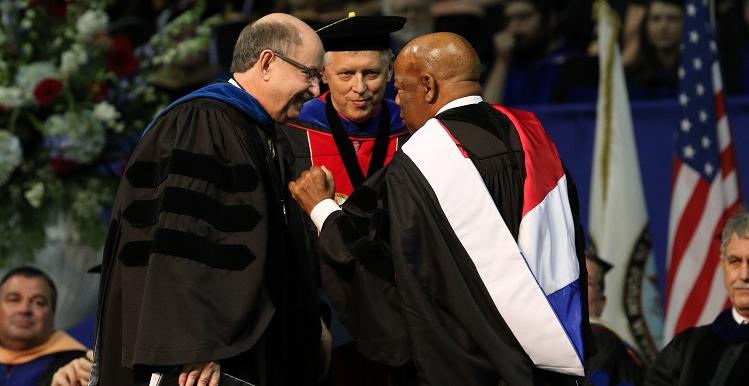 U.S. Rep. John Lewis was the commencement speaker for the University of South Alabama's 2015 Fall Commencement. He is joined on stage, from left, by Dr. Tony Waldrop, USA president, and Dr. David Johnson, provost and senior vice president for academic affairs.